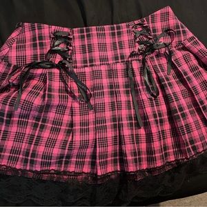 Pink plaid skirt with lace up design
